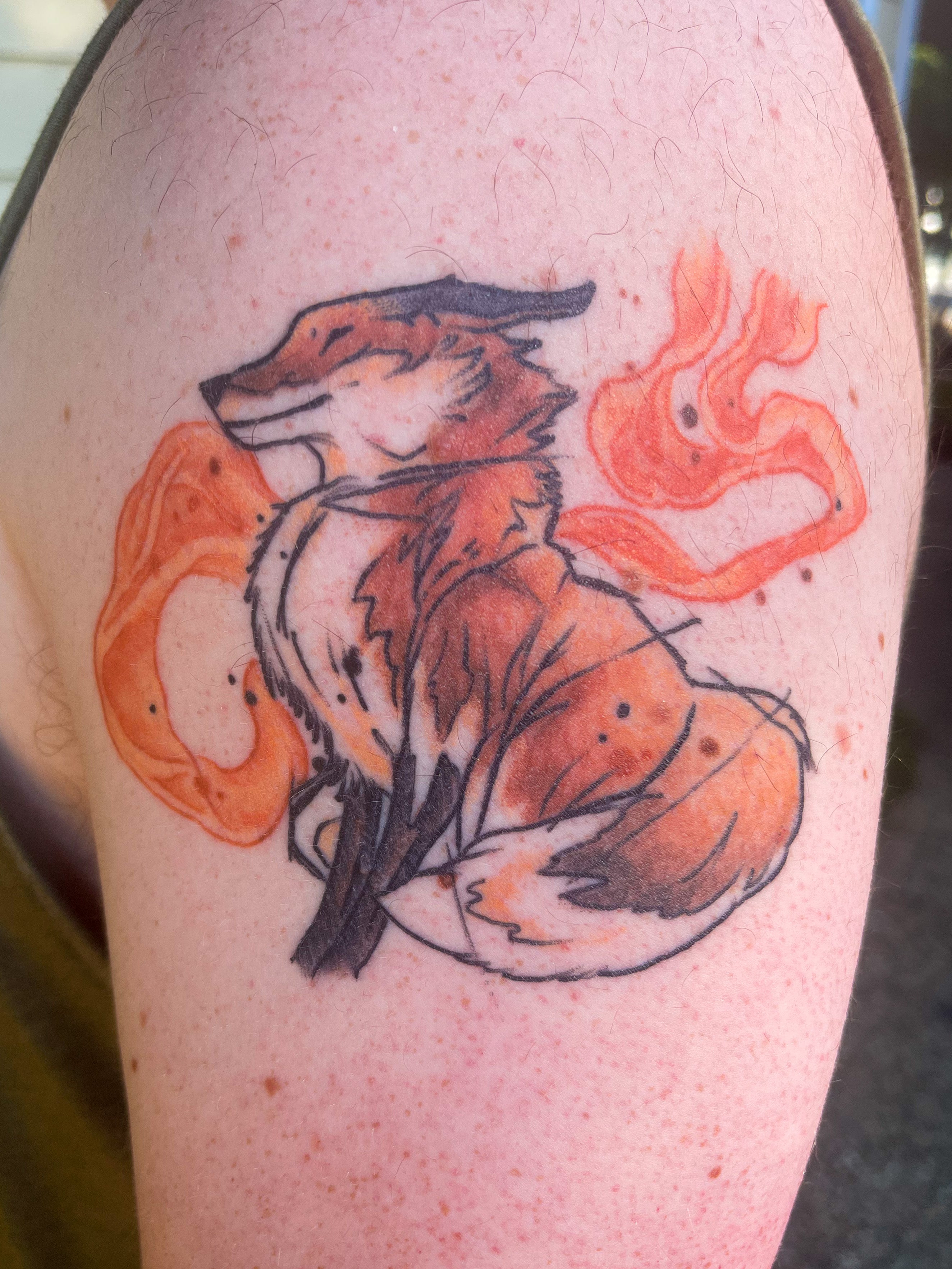 Original design blackwork and orange happy fox tattoo by Shannon Byrd of Fayetteville, AR